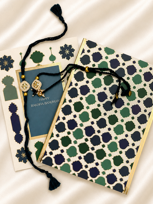 A flat-lay of Raksha Bandhan greeting cards and matching bhai bhabhi rakhi sets.